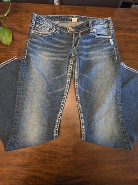 Silver Jeans Co. Embroidered Pocket Bootcut Jeans Thick Stitch Wash